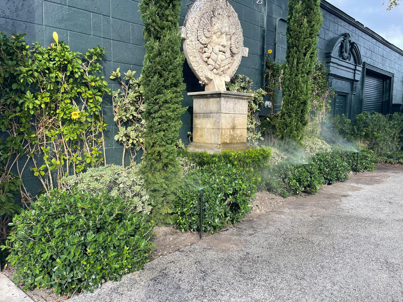 Greenscaper landscaped property with irrigation and planted beds